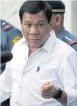  ??  ?? PRESSURE MOUNTS: Duterte promises the anti-drug programme will resume.