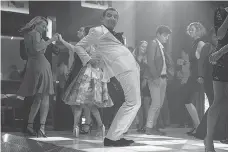  ?? UNIVERSAL PICTURES ?? Rowan Atkinson — as super spy Johnny English — does provide some laughs in an all-too-brief dance sequence.