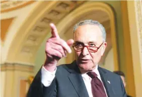  ?? AP PHOTO/JACQUELYN MARTI ?? Senate Majority Leader Chuck Schumer of N.Y., calls on a reporter as he speaks after a Democratic policy luncheonl Tuesday in Washington.