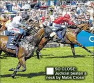  ??  ?? SO CLOSE: Judicial beaten a neck by Mabs Cross