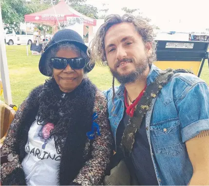  ?? POWERFUL PERFORMANC­E: Eddie Mabo’s widow Bonita with singer John Butler at the Mabo Festival. Picture: AAP IMAGE ??