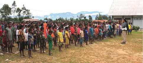  ??  ?? This file picture shows Papuan children gathering at a temporary shelter in Wamena, Indonesia’s Papua province. — AFP photo