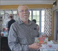  ??  ?? Philatelis­t Brainard Fitzgerald of Port Williams gave a presentati­on on the history of the Valley apple industry at Prescott House Museum in Starr’s Point Sept. 11.