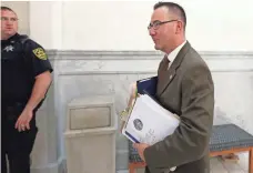  ?? POOL PHOTO BY DAVID MAIALETTI ?? Cheltenham Police Sgt. Richard Schaffer leaves the courtroom Monday after testifying for Bill Cosby’s defense team.