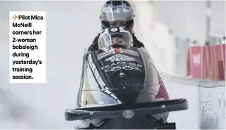  ??  ?? 3 Pilot Mica Mcneill corners her 2-woman bobsleigh during yesterday’s training session.