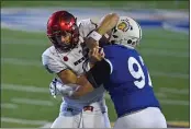  ?? JOSE CARLOS FAJARDO — BAY AREA NEWS GROUP, FILE ?? The Spartans’ Cade Hall tackles UNLV quarterbac­k Max Gilliam in the first quarter of their Nov. 14 game at CEFCU Stadium in San Jose.