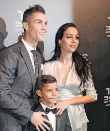  ?? ?? CRISTIANO Ronaldo, his girlfriend Georgina Rodriguez and his son Cristiano Ronaldo jr arrive for the Best Fifa Football Awards 2017. | EPA