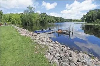  ?? MIKE DE SISTI ?? The property includes a boat dock. John Taylor and Dave Porter purchased the land for its seclusion.