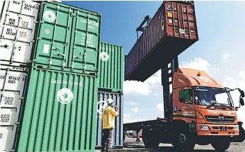  ??  ?? According to Kenanga Research, the company has been expanding their logistics division through ventures into cross-border trucking and e-fulfilment services.