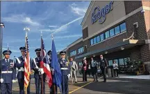  ?? KARA DRISCOLL / STAFF ?? Officials celebrate the opening of the Cornerston­e of Centervill­e Kroger in June 2017.