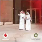  ??  ?? Vodafone Qatar CEO Sheikh Hamad Abdulla Jassim al-Thani (left) and Msheireb Properties acting CEO Ali al-Kuwari touring Msheireb Downtown Doha.