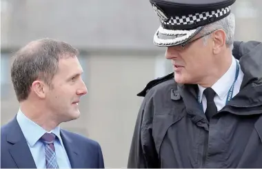  ??  ?? Influence: Justice Secretary Michael Matheson and former Chief Constable Phil Gormley