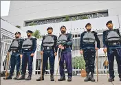  ?? ?? Security personnel stand guard outside the parliament house building in Islamabad, Pakistan on Thursday.