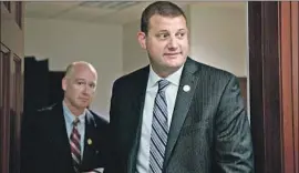  ?? Bill Clark CQ Roll Call ?? CONGRESSMA­N David Valadao’s family farm in Tulare County was seized by a bank over $8.3 million in unpaid loans. Above, Valadao in the Capitol in October.