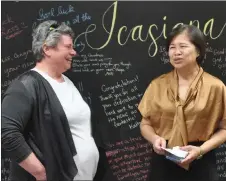  ?? ?? Icasiana de Gala (at right) speaks to Jackie Powell of Partners in Employment during the come-and-go farewell at the Southwest Newcomer Welcome Centre, April 13.