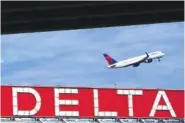  ?? AP PHOTO/BRYNN ANDERSON ?? A Delta Air Lines plane takes off from Hartsfield-Jackson Atlanta Internatio­nal Airport in Atlanta in 2022.