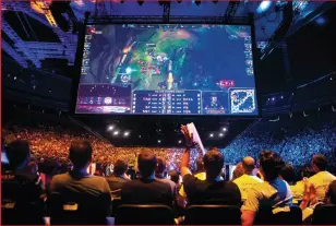  ??  ?? League of Legends has a huge esports scene. Pre-COVID, packed arenas like this were common.