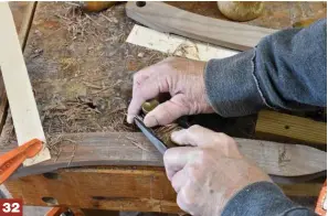  ??  ?? 32-33 A block plane can be used across the grain as well as with the grain. Here, I’m planing the bottom middle section of the arm. Other sections require the use of a rasp.