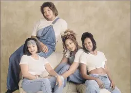  ?? 20th Century Fox ?? ERIKA ALEXANDER, far right, with “Living Single” cast members Queen Latifah, clockwise from top left, Kim Coles and Kim Fields, hit big with a braided bob.