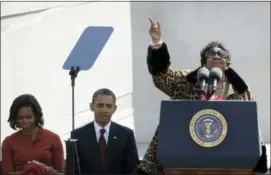  ?? CHARLES DHARAPAK — THE ASSOCIATED PRESS FILE ?? In this file photo, Aretha Franklin sings before President Barack Obama speaks during the dedication of the Martin Luther King Jr. Memorial in Washington.