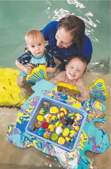  ?? Picture: ANNA ROGERS ?? WATER BABIES: Focus on Movement Swim School owner and instructor Christine Jervis in the pool with her son Max, 10 months, and Billie Lopes, 3, ahead of Learn2Swim week.