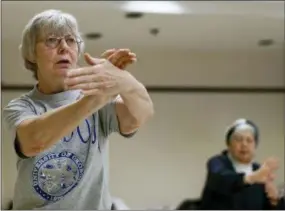  ?? THE ASSOCIATED PRESS ?? Marlene Burkgren, 67, of Ashburn, Va., teaches a Tai Chi class at Cascades Loudoun County Senior Center on Tuesday in Sterling, Va. It stands to shift the direction of the nation’s highest court for decades, but President Donald Trump’s move to fill a...