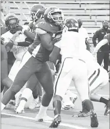  ?? Fred Conley • Times-Herald ?? Forrest City senior lineman Aston Joiner works against a Little Rock Mills lineman during a recent game played at Sam Smith Stadium. The Mustangs will host Batesville Friday for the 2021 homecoming game.