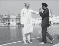  ?? CP PHOTO ?? Prime Minister Justin Trudeau and Minister of National Defence Minister Harjit Singh Sajjan visit the Golden Temple in Amritsar, India on Wednesday.