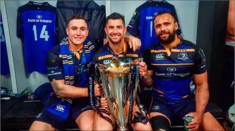  ?? Photo by Ramsey Cardy/Sportsfile. ?? Rob Kearney (centre) with Rory O’Loughlin and captain Isa Nacewa celebrate with the cup in the dressing room after the European Rugby Champions Cup Final in Bilbao, Spain.