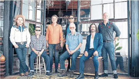  ?? ?? Blue Rodeo, comprising Jimmy Bowskill, left, Bazil Donovan, Jim Cuddy, Mike Boguski, Greg Keelor, Glenn Milchem and Colin Cripps, released a new album Friday called “Many a Mile.” DUSTIN RABIN