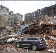  ?? THE ASSOCIATED PRESS ?? In this March 27, 2015file photo, a pile of debris remains at the site of a building explosion in the East Village neighborho­od of New York.