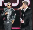  ?? FRANK MICELOTTA/ THE ASSOCIATED PRESS/FILE ?? Pharrell Williams, left, and Robin Thicke are appealing a copyright infringeme­nt ruling over the song Blurred Lines.