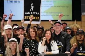  ?? Photograph: Mike Blake/Reuters ?? Sag-Aftra president Fran Drescher, center, and union members after negotiatio­ns ended on 13 July 2023.