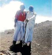  ?? PHOTOS: SUPPLIED ?? Balinese priest Jero Mangku Ada, left, at the summit of Mt Agung after a group of priests climbed the mountain to make an offering and Ada, right, at his home in Temukus village in the Besakih area, 6km from the summit of Mt Agung.