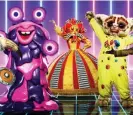  ?? ?? The Harlequin (centre) in ITV’s 2020 Masked Singer series was unmasked as Gabrielle. Photograph: Vincent Dolman/Bandicoot TV/ITV/PA