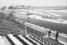  ?? MANU FERNANDEZ THE ASSOCIATED PRESS ?? The Catalunya racetrack is pictured with seating covered in snow before F1 testing Wednesday.