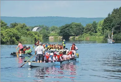  ?? LAWRENCE POWELL ?? Dragon boat races, river tours, canoe races, and lots of food and entertainm­ent were the order of the day on July 16 at Jubilee Park in Bridgetown as hundreds of people took part in the second annual Annapolis River Festival.