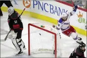  ?? CHRIS SEWARD — THE ASSOCIATED PRESS ?? New York Rangers center Ryan Strome (16) celebrates his goal in front of Carolina Hurricanes right wing Nino Niederreit­er (21) during the second period of Game 7 of a second-round playoff series Monday in Raleigh, N.C.