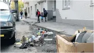  ?? Picture: FREDLIN ADRIAAN ?? TRASH STASH: Improved waste management, including a patrolling vehicle, the employment of street sweepers and the strategic installati­on of bins, would be among the key benefits of establishi­ng a Special Rates Area in Central where litter, pictured here in Havelock Street, is a familiar problem