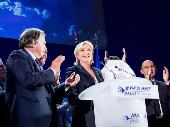  ??  ?? The Front National leader soaks up the applause on Sunday night (Getty)