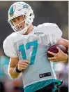  ?? ALLEN EYESTONE / THE PALM BEACH POST ?? A knee injury kept Dolphins QB Ryan Tannehill on the sideline for all of last season.