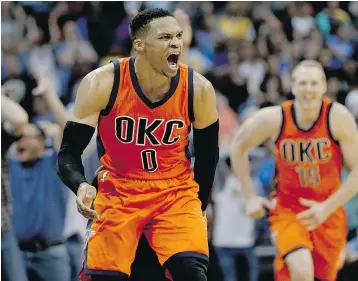  ?? — GETTY IMAGES ?? Russell Westbrook of the Thunder celebrates after scoring a game-winning, threepoint shot against the Nuggets in Denver, Colo., on Sunday.