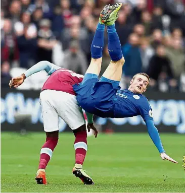  ?? — Reuters ?? This isn’t rugby: Leicester’s Jamie Vardy is fouled in the English Premier League match against West Ham at the London Stadium on Saturday.