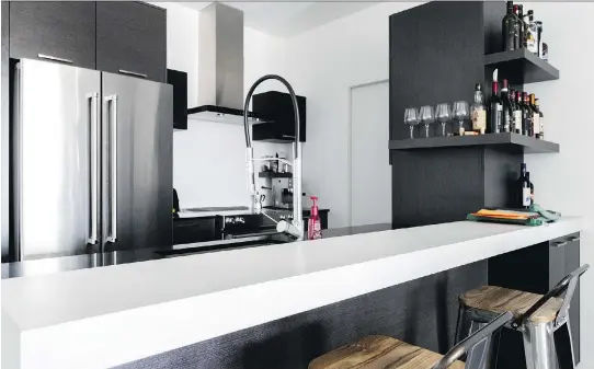  ?? DAVE SIDAWAY ?? Stefano Faustini likes clean, minimalist lines in his decor, which is certainly evident throughout his Rosemont–La Petite-Patrie condo.