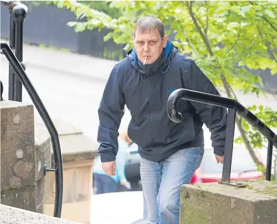  ??  ?? Dog owner John Towns arriving at Forfar Sheriff Court.