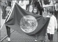  ?? AP/OLGA RODRIGUEZ ?? Young science supporters walk along Market Street in San Francisco as the March for Science crowd there makes it way downtown to City Hall.