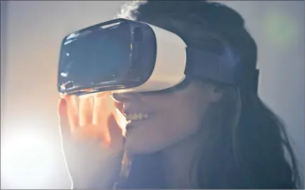  ??  ?? MAKE-BELIEVE:VIRTUAL Reality is used in everything from gaming to TV viewing.