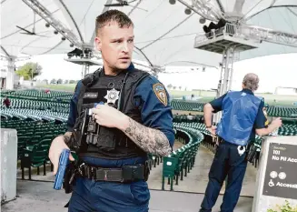  ?? Jason Fochtman/Staff file photo ?? A Harris County sheriff ’s deputy works the scene during a simulated terrorist attack Oct. 26 at the Cynthia Woods Mitchell Pavilion. More than 50 agencies participat­ed.