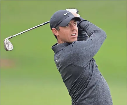  ?? /RICHARD HEATHCOTE/GETTY IMAGES ?? Rory McIlroy, above, said Tuesday that Tiger Woods is ‘just being careful’ after he withdrew Monday from this week’s Arnold Palmer Invitation­al. McIlroy practiced at Bay Hill Club &amp; Lodge on Tuesday.