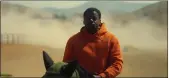  ?? COURTESY OF UNIVERSAL ?? Writer and director Jordan Peele rustles up some horror at a horse ranch in “Nope,” starring Daniel Kaluuya.